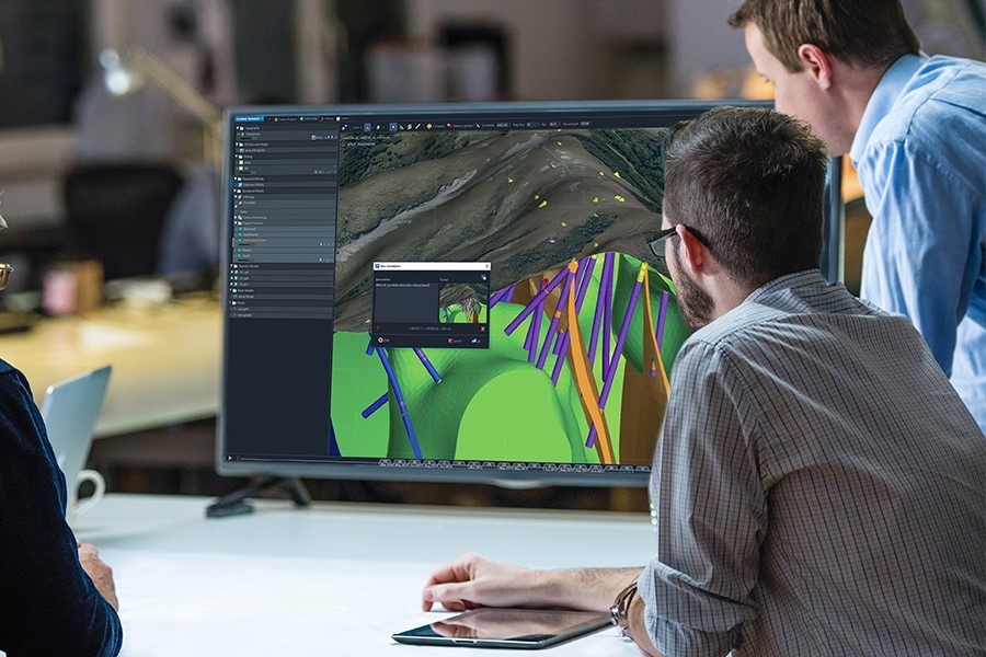 Seequent developers reviewing a geoscience 3D model together